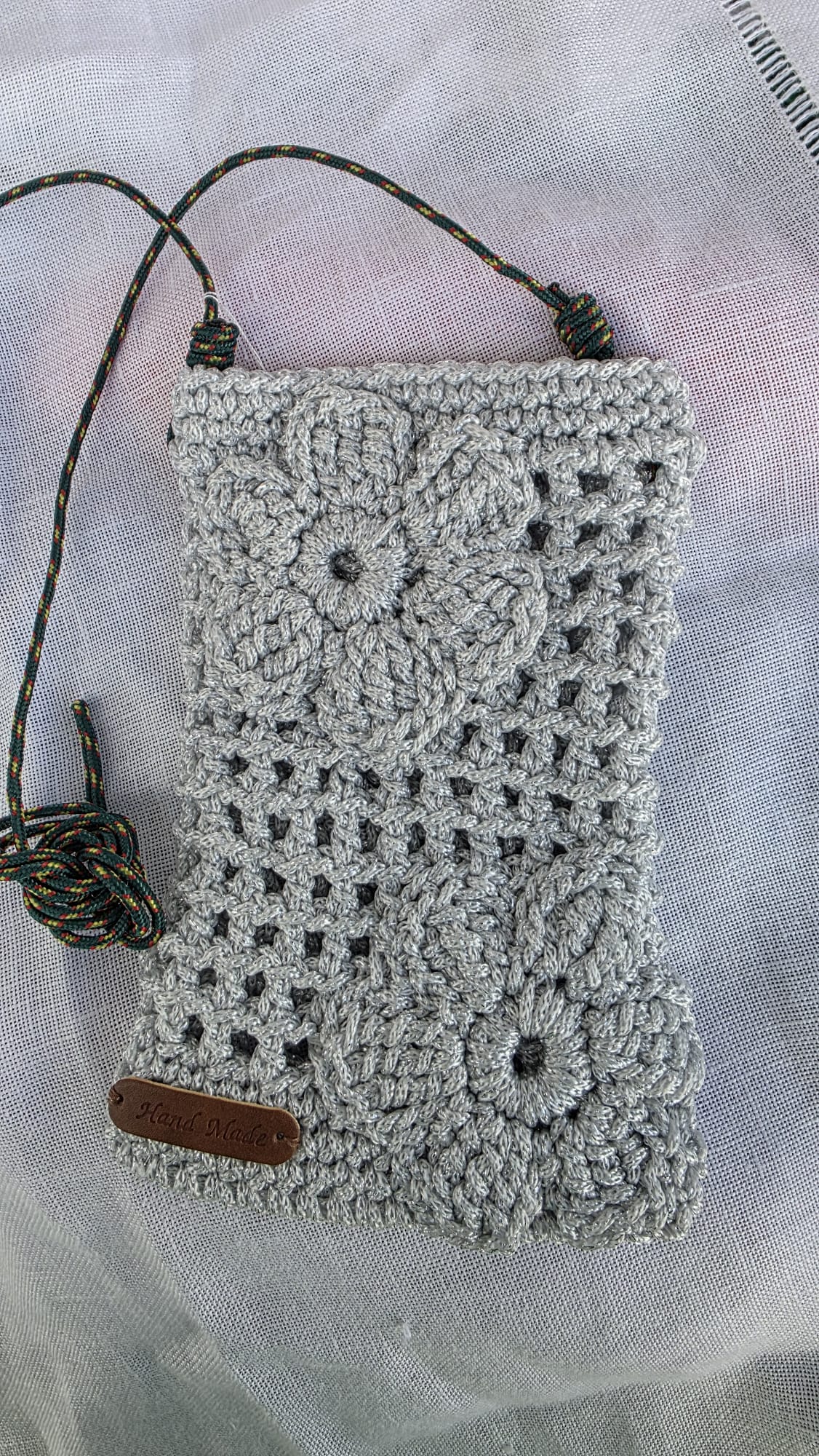 Bolso de ganchillo portamóvil